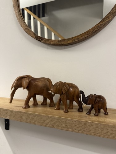 Hand carved wooden - hand, elephants