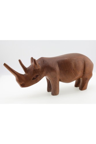 Hand carved wooden rhino - hand,